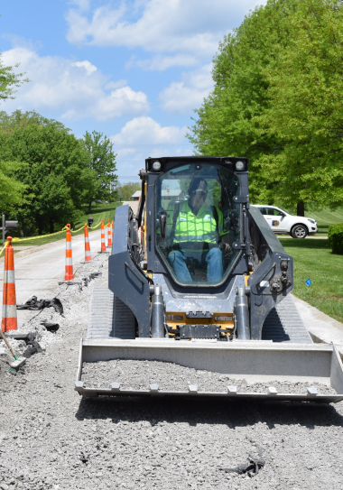 Kenton County Public Works employee making road repair