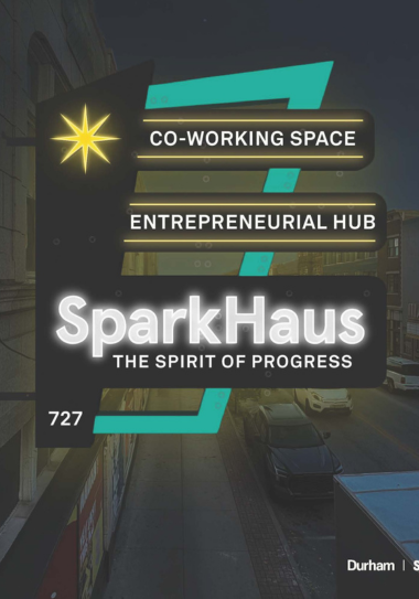 Neon signs saying SparkHaus at night