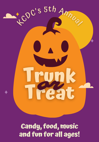 Orange pumpkin on purple background with Trunk or Treat